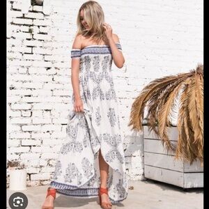 Beautiful summer dress with hidden from slit.